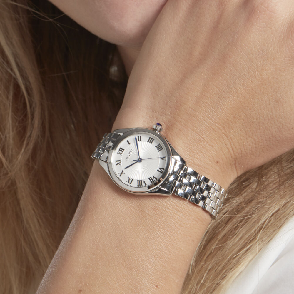 Montre Femme Andreas Osten Cadran 36mm en Acier Blanc Et Bracelet Bleu et  Rose en Nylon
