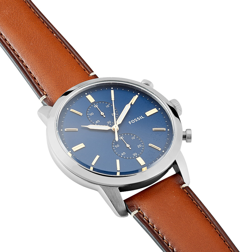 Montre fossil homme fond bleu
